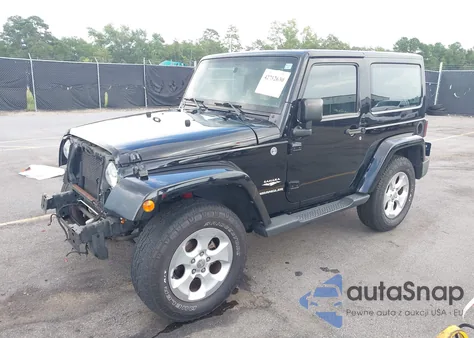 2015 Jeep Wrangler Sahara z USA, uszkodzony, nr VIN 1C4AJWBG4FL605659